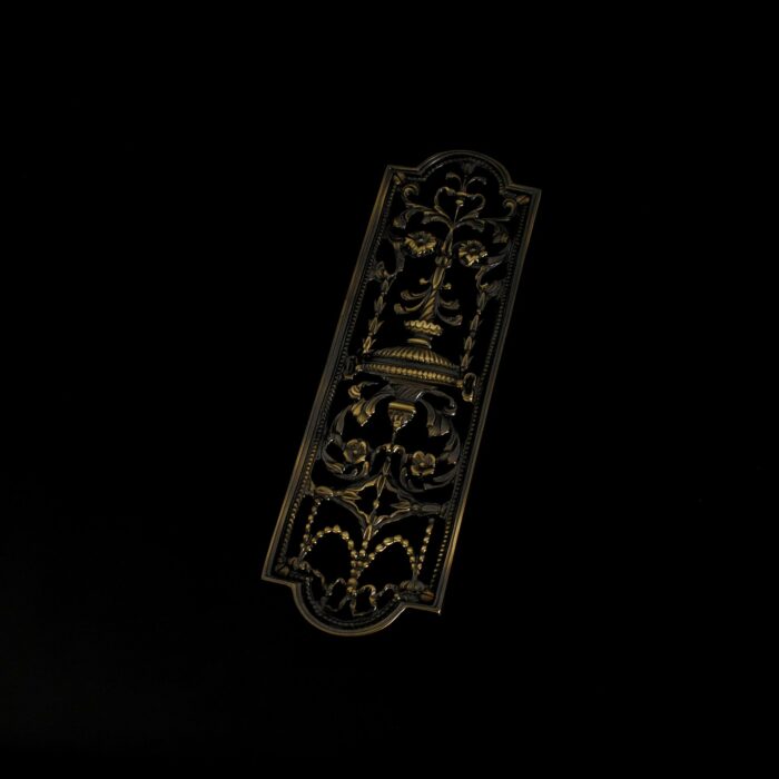 Picture of a Neoclassical Adam 103 Push Plate in an Medium Antique Brass colour.